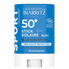 Blue sunscreen stick labeled Laboratoires de Biarritz Sport 50+ Stick Solaire Bleu. States Très Haute Protection, Very High Protection, Water Resistant, Cosmos Organic, and Bio. This organic stick features white text on blue packaging. Product is a solid cylinder with rounded edges and a matte plastic finish. The shot shows only the stick against a plain background with no people visible.