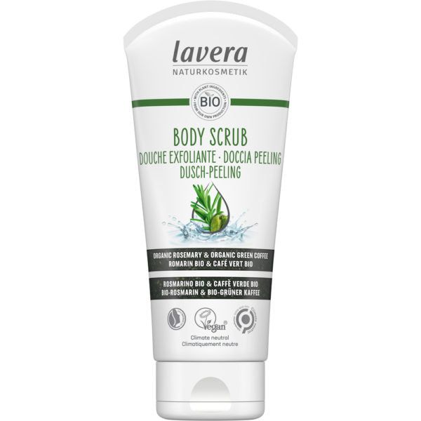 A white tube of Lavera Body Scrub featuring green text and images of rosemary and coffee beans, labeled as organic, vegan, and climate neutral, with multilingual product details. Tube has a matte surface and rounded edges; green sans-serif font is used for most text. The tube stands upright against a plain light background. No people or hands are visible in the image.