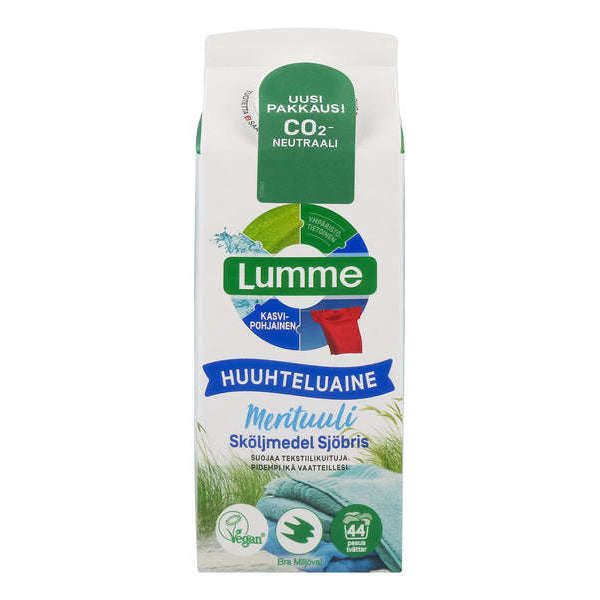 A carton of Lumme Minttuuli fabric softener featuring green and blue eco-friendly labels, vegan symbols, and text in Finnish. Rectangular, plastic bottle with a white screw cap; matte label surface; mostly white packaging with block sans-serif font for product name; illustrated leaf icon visible on front. No people or hands present. Plain background, product centered in frame.