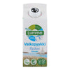 A carton of Lumme Valkopyykki laundry detergent with nature-themed graphics, including water, grass, and a sailboat. Box is rectangular, made of matte-finish cardboard. Front label features blue and green details and simple sans-serif text. Vegan logo and eco-friendly product information are clearly visible on the front. Plain white background, no people or actions shown.