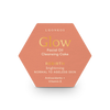 Luonkos Glow & Shine Skincare Set; kuusikulmainen persikanvärinen rasia tekstillä ”LUONKOS Glow Facial Oil Cleansing Cake: Rebirth Brightening, Normal to Ageless Skin”, sisältää antioksidantteja ja E-vitamiinia, valkoisella taustalla; mattapintainen paperipakkaus mustalla tikkukirjasimella ja kultaisella antiikvatypografialla etusivulla; ei ihmisiä tai käsiä kuvassa; rasia keskitettynä tasaiselle valkoiselle taustalle, kuvattu ylhäältä hieman viistosti.