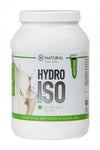 M-Natural HydroIso -heraproteiinijauhe; valkoinen lieriömäinen purkki mattapinnalla, vihreitä yksityiskohtia, etiketissä maitoroiskekuvio; teksti HYDRO ISO Natural Whey Protein, no artificial sweeteners or colors, 600g; kuvattu vaalealla taustalla, ei ihmisiä.