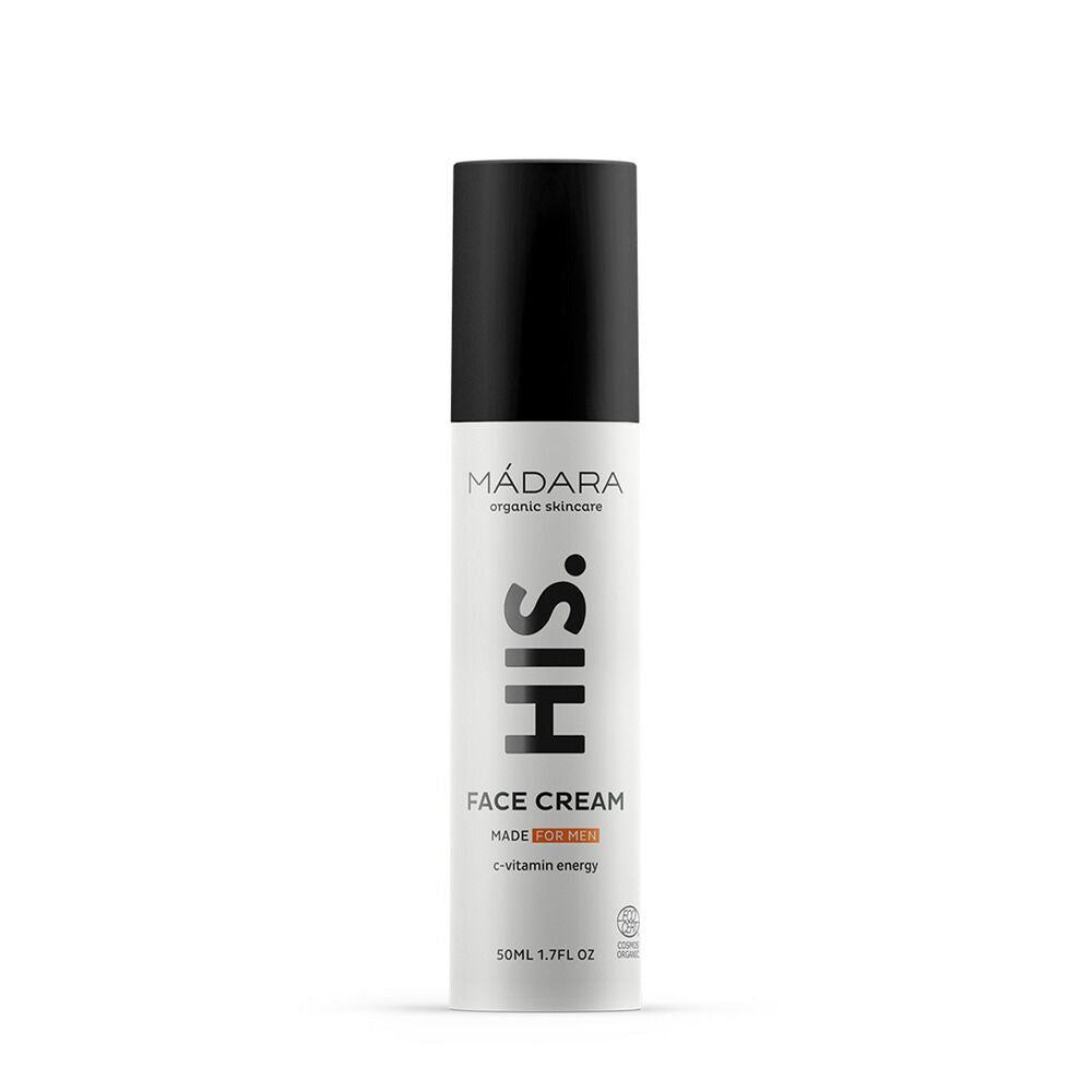 Madara HIS Face Cream; valkoinen pullo luomuihonhoitoa, mustalla korkilla, merkitty miehille, sisältää vitamiinienergiaa, 50 ml:n koko; sylinterinmuotoinen, mattapintainen; etiketissä lihavoitua mustaa groteskitekstiä; ei ihmisiä tai käsiä näkyvissä; yksivärinen tausta, kuva suoraan edestä etikettitekstin selvästi näkyen.