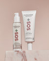 Madara SOS+ SENSITIVE Moisturiser ja Night Cream vaaleanpunaisella taustalla