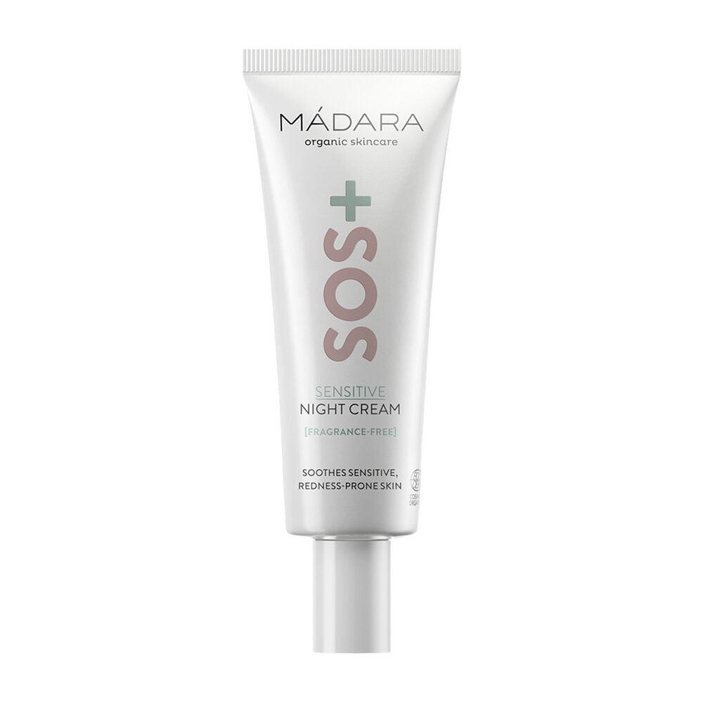 Madara SOS+ SENSITIVE Night Cream; valkoinen tuubi Mádara SOS Sensitive Night Cream -tuotetta mattaharmaalla korkilla, etiketissä groteskitypografiaa; teksti sisältää maininnan ”fragrance-free” sekä kertoo rauhoittavan herkkää, punoittumisalttiita ihoa; tuubi seisoo pystyssä vaaleaa taustaa vasten; ei ihmisiä tai muita esineitä kuvassa.