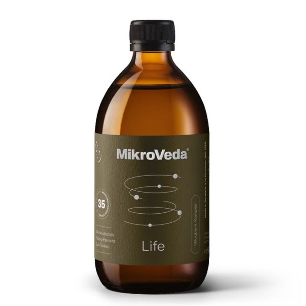 A brown glass bottle with a black plastic cap labeled MikroVeda Life features a green, glossy label with white sans-serif text and simple graphic elements. The label legibly states “35 strains of probiotics and enzymes.” The bottle is cylindrical. The background is plain and uncluttered, product shown upright in center.