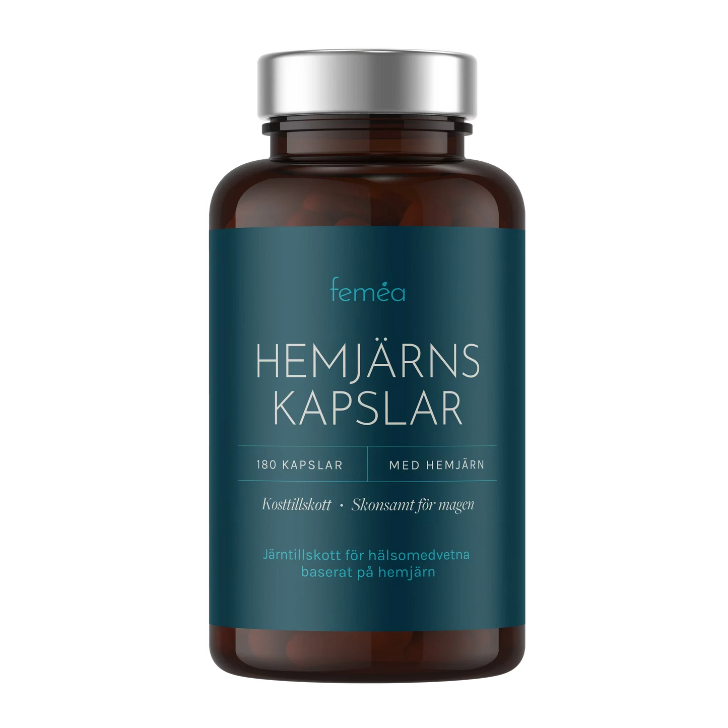 Mini Ferrum Feméa Hemirautakapselit; ruskea pullo tummansinisellä etiketillä tekstillä femeá Hemjärns Kapslar, tuotetiedot koskevat vatsalle hellävaraisia rautakapseleita; pullossa 180 kapselia suunniteltu helposti siedettäväksi; pullo sylinterin muotoinen muovia mattapinnalla ja kierrekorkilla; etikettiteksti valkoisella groteskikirjasimella; tausta valkoinen, ei käsiä tai ihmisiä.