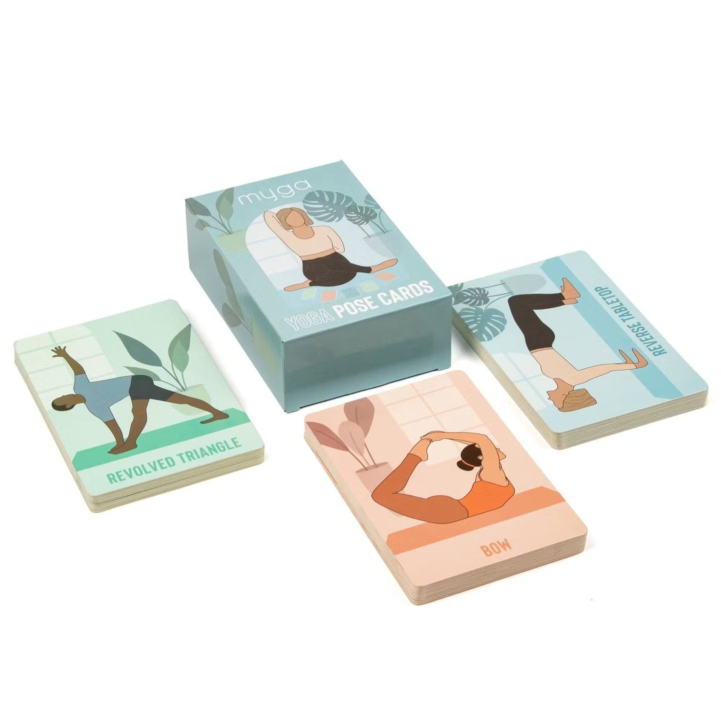 A rectangular box labeled “Yoga Pose Cards” sits on a matte white surface, with several illustrated cards partially fanned out in front. The cards show named yoga poses: Revolved Triangle, Bow, and Three-Legged Dog. The label uses clear sans-serif type. No people or hands are visible in the image. A box labeled Yoga Pose Cards with illustrated cards showing yoga poses such as Revolved Triangle, Bow, and Three-Legged Dog, all neatly arranged on a white surface—perfect for enhancing your mindfulness practice.