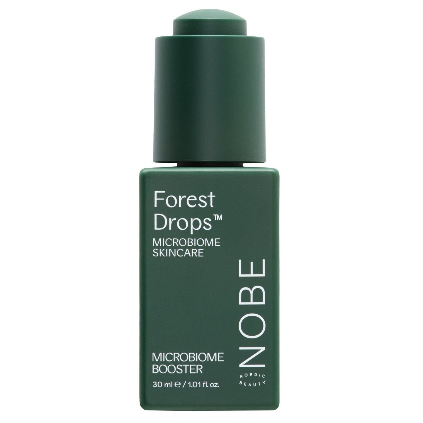 A green bottle labeled Forest Drops Microbiome Booster by NOBE Nordic Beauty, 30 ml / 1.01 fl. oz., with a matching green cap, shown against a white background. Bottle has a cylindrical shape and matte finish; label uses sans-serif font in white contrasting with the dark green surface. No people or other items are present in the photo.