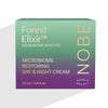 NOBE Forest Elixir® Microbiome Restoring Day & Night Cream: rasia NOBE Forest Elixir Microbiome Skincare Day & Night Cream -tuotetta, 50 ml, vihreä-violetti liukuvärillinen pakkaus kulta- ja valkoisella tekstillä, kaava auttaa palauttamaan ihon mikrobiomia; suorakulmainen kartonkirasia kiiltäväpinnalla, groteskikirjasin; ei ihmisiä tai käsiä näkyvissä, tuote kuvattu valkoista taustaa vasten suoraan edestä.
