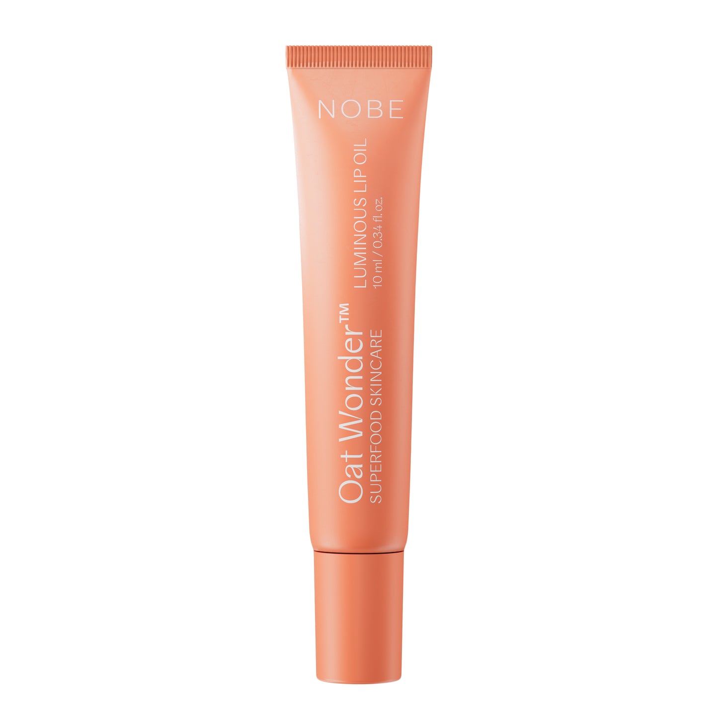 Persikanvärinen NOBE Oat Wonder Superfood Skincare Luminous Lipoil -putkilo kauraekstraktilla, 10 ml, seisoo pystyssä valkoisella taustalla; putkilo muovia mattapinnalla, lieriömäinen kartiomaisella korkilla; tuote- ja bränditeksti painettu pystysuunnassa yksinkertaisella groteskikirjasimella valkoisena ja oranssina; ei ihmisiä tai rekvisiittaa näkyvissä, tuote keskitettynä vaalealle taustalle.