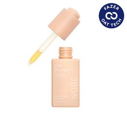 A beige, cylindrical dropper bottle with matte finish has a white cap and shows “Oat Wonder INOBE” in bold sans-serif text. The transparent pipette contains yellow serum. A blue circular badge on the label reads “FAZER OAT TECH” in all-caps white font. The bottle stands alone against a plain background. A beige dropper bottle labeled Oat Wonder INOBE features a dropper displaying yellow serum. A blue circular badge highlights FAZER OAT TECH in white, emphasizing innovative oat technology.