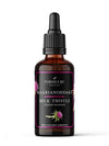 A dark glass dropper bottle labeled Nordicure Milk Thistle (Silybum marianum) with illustrations of purple thistle flowers. Label includes icons or text indicating liver, blood sugar, and heart health benefits, and mentions silymarin. The label uses a mix of sans-serif and serif fonts on a white background. No people or hands are present; product is photographed against a plain backdrop.