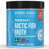 A container of Nordic Kings Arctic Fish Broth with blue label, fish illustration, and text highlighting its wild-caught cod, keto and paleo friendly qualities from Norway. The packaging features Swedish and Norwegian flags and contains 400g. The plastic container is cylindrical with a clear body and blue matte-finish lid. Sans-serif fonts are used for main label text. The product is photographed against a white background with even lighting; no people or hands are present in the shot.