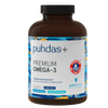 Puhdas+ Premium Omega-3 -pullo; ruskea, sylinterimäinen ja kiiltäväpintainen muovipullo valkoisella kierrekorkilla; sinisessä ja valkoisessa etiketissä tekstausvapaata tekstiä tuotenimestä, sertifiointimerkkejä ja suomenkielisiä lisätietoja; pullo seisoo pystyssä valkoista taustaa vasten, ei ihmisiä tai käsiä näkyvissä.