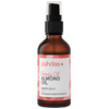 Puhdas+ Beauty Oil Manteliöljy -pullo, 50 ml; ruskea, sylinterimäinen ja kiiltäväpintainen lasipullo mustalla pumpulla, etiketissä vaaleanpunaisia ja valkoisia korostuksia; siistiä tummaa tekstausvapaata tekstiä vaalealla pohjalla; teksti mainitsee puhtaan mantelin öljyn ja suomalaisen alkuperän; kuvattu neutraalia taustaa vasten, ei ihmisiä tai muita esineitä.