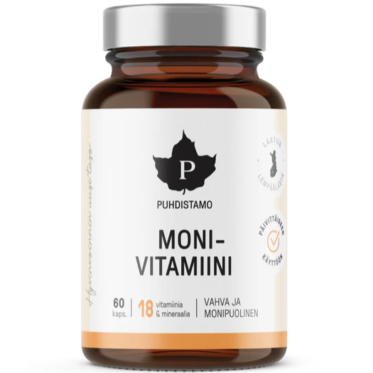Puhdistamo Monivitamiini; ruskea pullo, sisältää 60 kapselia, korostaa 18 tärkeää vitamiinia ja kivennäisainetta; pääosin valkoinen etiketti mustalla ja oranssilla tekstillä selkeällä groteskikirjasimella; vaahterapuun lehtilogo etiketin yläosassa; pullo on sylinterinmuotoinen mattapinnalla; kuvattu valkoisella taustalla, ei ihmisiä tai käsiä näkyvissä.