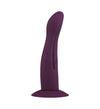 A purple silicone vibrator with a curved, smooth design and a flared suction base is shown on a white background. The surface appears matte, no packaging or text is visible, and there are no people or hands present. The product is the only object in the image, centered in a well-lit studio shot.