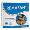 REMASAN-pakkaus, osterivinokaskuva etupaneelissa; valkoinen-beige mattapintainen rasia, vegaani- ja suomalaismerkit, teksti suomeksi ja ruotsiksi