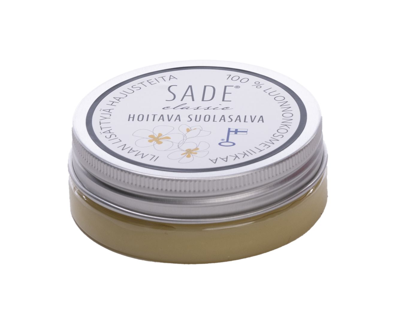 A small round container of Sade Classic Hoitava Suolasalva with a white lid, featuring Finnish text, simple floral graphics, and soothing elements on the label. The container is plastic with a matte finish and holds yellowish balm. The label design uses minimal colors and the typography is sans-serif. The product is shown against a plain background in a close-up shot.