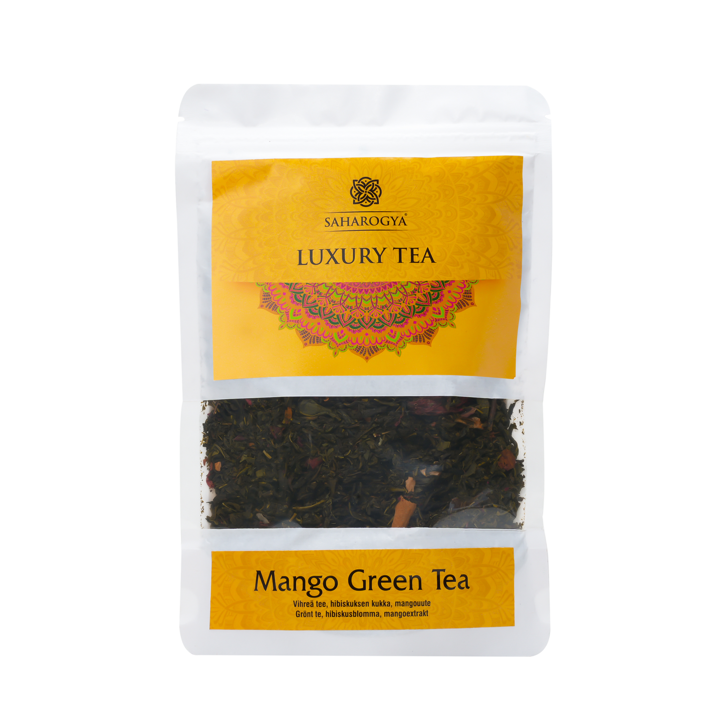Saharogya Mango Green Tea; valkoinen ja keltainen pussi merkitty "Luxury Tea", alla teksti "Mango Green Tea"; pakkauksessa läpinäkyvä ikkuna, josta näkyy irtonaisia mango-vihreän teen lehtiä; pussi on suorakulmainen ja mattapintainen, tuotenimet painettu lihavoidulla groteskikirjasimella; ei ihmisiä tai muita rekvisiittoja näkyvissä, kuvattu yksivärisellä taustalla.