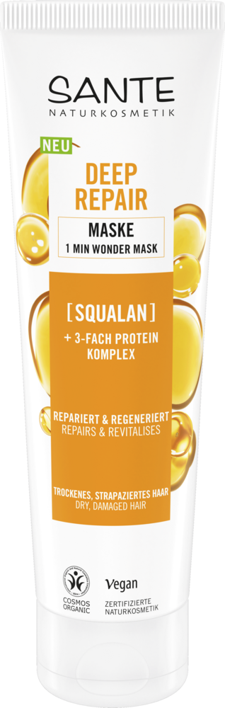 Sante Deep Repair Hiusnaamio; valkoinen tuubi hiusnaamiota skvalaanilla ja proteiinikompleksilla; pakkaus on sylinterinmuotoinen mattapinnalla ja esittää kultaisia pisarakuvituksia etiketissä; etuosan teksti mainitsee korjaavat hyödyt, luomusertifioinnin, vegaanikaavan ja kasviperäiset ainesosat; ei ihmisiä tai käsiä näkyvissä; neutraali tausta; tuote on tarkoitettu kuiville, vaurioituneille hiuksille.