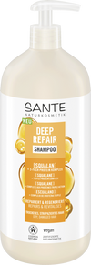 Sante Deep Repair Shampoo; pullo skvalaanishampoota, kuvassa kultaisia kuplia ja valkoista tekstiä; pullo on sylinterinmuotoinen muovia mattapinnalla, mustalla pumppuannostelijalla; etikettitypografia on pääosin valkoista groteskia; tekstissä mainitaan vegaanisuus ja sopivuus kuiville, vaurioituneille hiuksille; tausta vaalea, ei ihmisiä näkyvissä.
