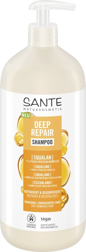 Sante Deep Repair Shampoo; pullo skvalaanishampoota, kuvassa kultaisia kuplia ja valkoista tekstiä; pullo on sylinterinmuotoinen muovia mattapinnalla, mustalla pumppuannostelijalla; etikettitypografia on pääosin valkoista groteskia; tekstissä mainitaan vegaanisuus ja sopivuus kuiville, vaurioituneille hiuksille; tausta vaalea, ei ihmisiä näkyvissä.