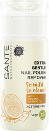 Sante Hellävarainen Kynsilakanpoistoaine; pullo Sante Extra Gentle Nail Polish Remover -kynsilakanpoistoainetta luomuappelsiiniöljyllä, merkitty asetonittomaksi, vegaaniseksi ja luomuksi; säiliö lieriömäinen valkoisella kannella ja puoliläpinäkyvällä rungolla; etiketissä appelsiinikuvitus, groteskitekstiä korostaen ympäristöystävällisyyttä ja kestävyyttä; tuote kuvattu valkoisella taustalla studiokuvassa, ei ihmisiä tai käsiä.