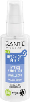 Sante Intense Hydration Hiuseliksiiri; pullo Sante Naturkosmetik Overnight Elixir Intense Hydration -hiuseliksiiriä hyaluronilla, sopii normaalille ja kuivalle tukalle; pakkaus sylinterin muotoinen pumppukorkilla mattaista muovia; värit valkoinen ja turkoosi; etiketissä teksti vegaanisuudesta, luomusta ja uutuudesta groteskikirjasimella; tausta neutraali ja tasainen, ei ihmisiä tai käsiä; suora tuotekuva.