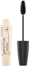 Sante Mademoiselle Sensitive Mascara; beige tuubi Sante Sensitive -ripsiväriä mustalla tekstillä ja mustalla harjasovaraajalla, esitetty erikseen; tuubissa mainitaan luomu, hajusteeton ja sisältää ravitsevaa manteliöljyä herkille silmille; muovituubi mattapinnalla ja lieriömäisellä muodolla; lihavoitua groteskitekstiä etiketissä; valkoinen tausta, lähikuva; ei ihmisiä tai lisärekvisiittaa.