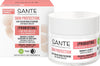 Round jar with matte pink lid and white base, paired with a rectangular box in matching pink and white colors. Packaging displays sans-serif type in black and pink. Both jar and box feature the product name and main ingredients. Background is plain white, no people or hands are shown. SANTE Skin Protection 24H Moisturizer with probiotics, bio-Inca inchi oil, and bio-sheabutter nourishes dry, sensitive skin. This vegan, certified natural cosmetic comes in a pink and white jar with a matching box.
