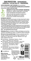 Sante Skin Protection Puhdistusgeeli; etiketti puhdistusgeelille saksaksi, sisältää ainesosat, käyttöohjeet, sertifioinnit ja kierrätystietoa; suorakulmainen muovipullo valkoisella mattaetiketillä ja vihrein korostein; mustaa groteskitekstiä selkeästi jaoteltuna osioihin; ei ihmisiä tai käsiä näkyvissä; kuva yksivärisellä taustalla.