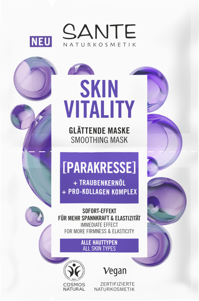 Sante Skin Vitality Kasvonaamio; SANTE Naturkosmetik Skin Vitality -tasoittava naamiopussi violetein kuplin, sisältää rypäleensiemenöljyä ja pro-kollageenikompleksin; sopii kaikille ihotyypeille, vegaaninen ja Cosmos Natural -sertifioitu; pussi on suorakulmainen mattapinnalla; pääväreinä valkoinen ja eri violetin sävyt; yksinkertainen groteskitypografia; ei ihmisiä tai käsiä näkyvissä kuvassa; tausta neutraali.