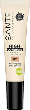 Sante Peitevoide; tuubi Sante High Coverage Mineral Concealer 02 -peitevoidetta luomu-shea-voilla ja mineraalipigmenteillä; pakkaus beige, sileä materiaali mattapinnalla, tavanomainen sylinterin muotoinen tuubi; mustaa groteskitekstiä etupuolella, BIO-symboli mukana; etikettiteksti selkeästi luettavissa; ei ihmisiä tai käsiä, tausta vaalea, tuote keskitettynä kuvaan.