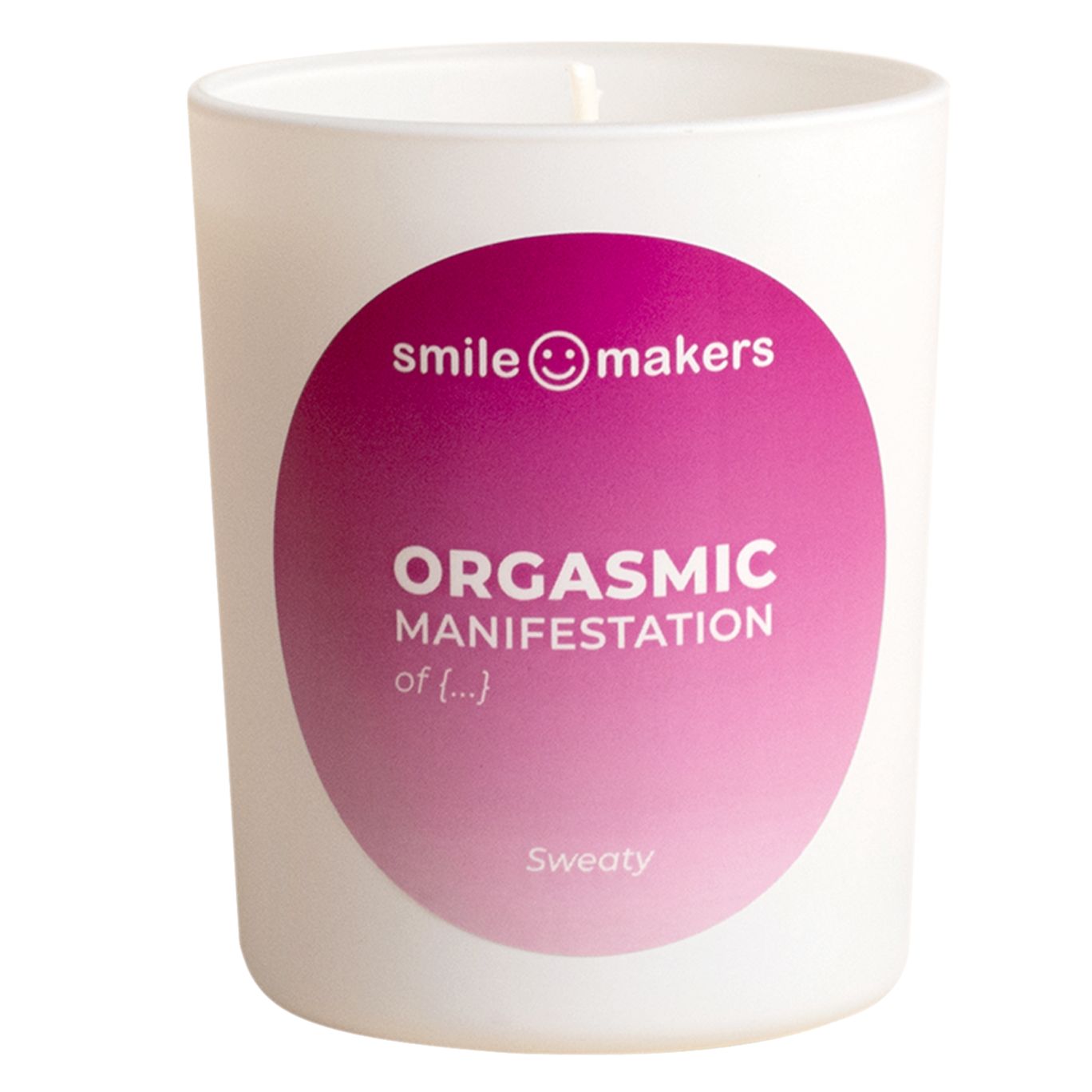 A white candle with a pink label that reads: smile makers. ORGASMIC MANIFESTATION of blissful energy. The candle is cylindrical, matte surface, no visible packaging besides the label. Sans-serif text on the label in two sizes and weights. Plain background, product isolated and centered in frame, no people or hands present.