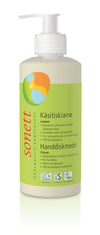 A bottle of Sonett Lemon Hand Dishwashing Liquid with a pump dispenser, featuring eco-friendly green and yellow labeling in Finnish and Swedish, and various certification logos at the bottom. The bottle is clear plastic with a matte surface, cylindrical shape, and white pump. Label uses sans-serif fonts. Product is centered on a plain white background; no people or hands visible.