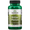 A bottle of Swanson Bitter Melon herbal supplement, labeled for blood sugar support, 500 mg full spectrum, with 60 capsules. The green plastic bottle has a glossy finish and a round shape with a black screw-on cap. Label text is in dark green and white sans-serif fonts. Product is photographed against a plain white background, no people or other objects visible.