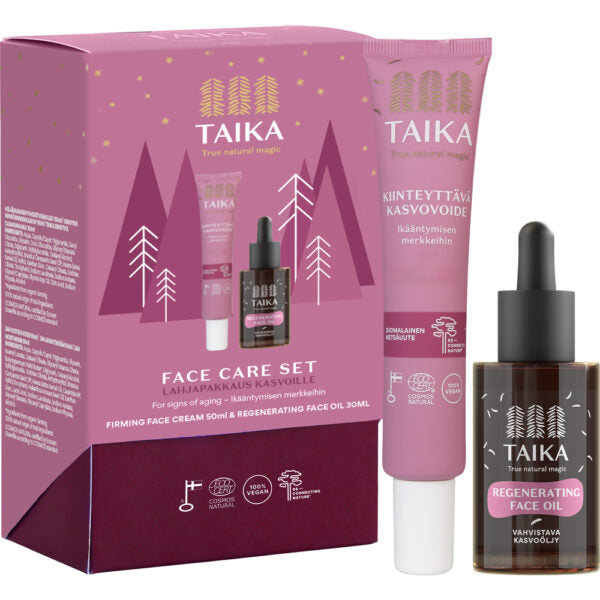 Taika Face Care Set; Taika-kasvonhoitosetti vaaleanpunaisessa pakkauksessa, vaaleanpunainen tuubi kiinteyttävää kasvovoidetta ja pieni ruskea pullo uudistavaa kasvoöljyä, kaikki merkitty valkoisella tekstillä ja yksinkertaisin metsäkuvituksin luonnollisesti hehkuvalle iholle; tuotteet mattapintaisia ja pyöreämuotoisia; groteskityypografia; kuvattu yläviistosta asetelmakuvana neutraalia taustaa vasten, ei ihmisiä tai käsiä.