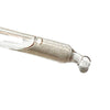 A close-up of a glass dropper with hyaluronic acid and tiny suspended particles, with a droplet forming at the tip, against a white background. The dropper is transparent and cylindrical, made of glass with a glossy finish. No label or text is visible on the product. The shot does not include hands or any other objects in the frame.