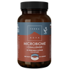 Terranova Microbiome Challenge; tumma, lieriömäinen pullo mustalla korkilla ja pääosin ruskealla rungolla; pullo lasia tai muovia mattapinnalla; etiketissä teksti ”TERRANOVA Microbiome Challenge, 50 vegetarian capsules, 100% vegan, no additives, food supplement” lihavoiduin fontein ja pelkistetyllä asettelulla; ei ihmisiä tai käsiä näkyvissä; tausta tasainen valkoinen.