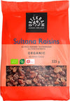 A 325g red package of Urtekram Organic Sultana Raisins is shown, featuring images of raisins, organic labels, and text highlighting no added sugar and always organic. The packaging is glossy plastic with a rectangular upright shape. The front includes white and green typography in varying sizes. All visible text is centered on the front panel. Background is plain white with no people or objects present.