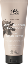 Urtekram Start Over Sweet Ginger Anti-Dandruff Hoitoaine, tuubi hilseenvastaiselle hoitoaineelle makean inkiväärikukan tuoksulla, sisältää panax-ginsengjuuriuutetta, aloe veraa, sertifioituja luomuainesosia ja vegaanisertifikaatin; tuubi vaaleansininen mattapinnalla ja läppäkorkilla; etikettiteksti keskitetty groteskifontilla; ei ihmisiä eikä käsiä näkyvissä; yksinkertainen studiotausta ilman rekvisiittaa.