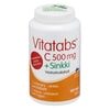 A white plastic cylindrical bottle with a matte finish; the label is mainly red and green with Finnish text, and features a small Finnish flag symbol. Typography is bold and sans-serif. The cap is white and ribbed. No people or hands are present. Neutral background, product centered in the frame. A white bottle of Vitatabs C 500 mg + Sinkki tablets with Finnish text, a red and green label, and a Finnish flag symbol, containing 100 chewable vitamin C and zinc tablets for daily immune support.