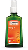 Weleda Arnica Massage Oil -pullo, vihreä lasi, oranssi suorakaiteen muotoinen etiketti keltaisin kukkakuvin, teksti "Strengthens and warms"; suorat sivut, valkoinen suihkekorkki, kiiltäväpintainen