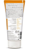 Weleda Sea Buckthorn Creamy Suihkuvoide; tuubin takaosa saksan- ja englanninkielisin teksteinä, listaten ainesosat, tuotetiedot, sertifioinnit ja käyttöohjeet; pakkaus valkoinen oranssein korostuksin korostaen luonnollisia ainesosia; muovituubi mattapintaisena kaarevine muotoineen; groteskityyppografia; valkoinen tausta, vain tuote kuvassa, ei ihmisiä tai käsiä.