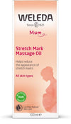 A box of Weleda Stretch Mark Massage Oil for mums, featuring a silhouette of a pregnant woman and text promoting reduction of stretch marks. Rectangular, upright cardboard packaging with a matte finish in white and orange tones. The front shows sans-serif font in multiple sizes; label states 100 ml bottle and notes suitability for all skin types and organic ingredients. No people or hands visible, shot against plain background.