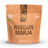 Oranssi uudelleensuljettava pussi, jossa lukee Well Aware RUUSUN MARJA LUOMU JAUHE 500g sekä vihreä vegaanilogo vasemmassa yläkulmassa, esiteltynä yhtenäisellä valkoisella taustalla; pussi mattapintainen ja seisoo pystyssä lämpösaumatuin reunoin; teksti lihavoitua ja groteskia, valkoisena ja vihreänä; ei ihmisiä tai muita esineitä näkyvissä.