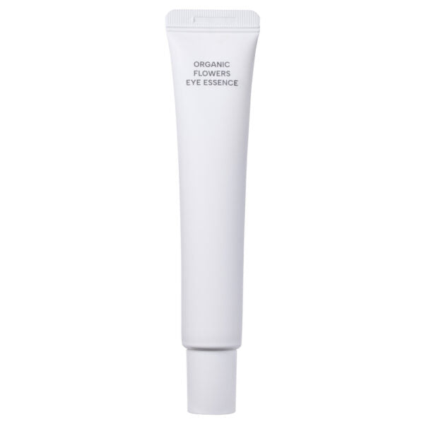 Whamisa Organic Flowers Eye Essence; valkoinen muovinen tuubi mattapinnalla ja kierrekorkilla seisoo pystyssä; etiketissä teksti ”ORGANIC FLOWERS EYE ESSENCE” yksinkertaisin groteskiversaalein; niukkoja kasviaiheisia viivapiirroksia tuubin alaosassa; tausta tasainen ja vaalea; ei ihmisiä tai muita esineitä kuvassa.