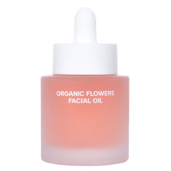Whamisa Organic Flowers Facial Oil Deep Rich; huurrelasinen pullo valkoisella tippakorkilla, tekstillä ”ORGANIC FLOWERS FACIAL OIL”, sisältää ravitsevaa vaaleanpunaista nestettä; lieriömäinen muoto sileällä mattapinnalla; etiketissä yksinkertaista mustaa versaaligroteskitekstiä; tuote keskitettynä vaalealle tasaiselle taustalle, kuvattu tasaisessa valaistuksessa; ei ihmisiä tai käsiä.